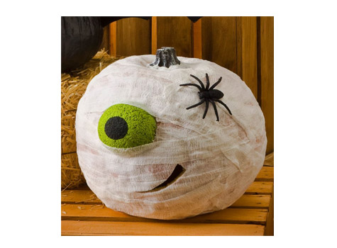 тыква-мумия с зеленым глазом
